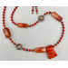 Necklace set | Sponge coral slider pendant over sterling silver and coral red rounds, Bali silver/copper, carnelian nuggets