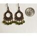 Copper hoop earrings with peridot green crystals size