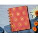 A small Blank notebook with a sunburst cover