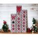 A decoupage wood sign that has wooden letters that says warm winter wishes.