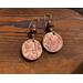 Floral textured air dry clay dangles in brown and pink hues, mookaite beads in the same colors on handcrafted 14k gold filled earring wires