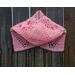 Another pic of a pink scarf with hearts along its length.