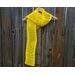Another pic of a yellow scarf with a zig zag pattern.