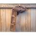 Another pic of a brown scarf with the letters Dad along its length.