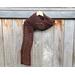 Another pic of a brown scarf with a zig zag pattern.