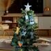 Three foot Christmas tree with Snowman Ornament.