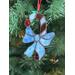 Close up of Candy Cane ornament on Christmas Tree.