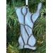 Close up of cat ornament (in gray) in Christmas Tree.