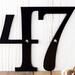 Close up of our 2 digit metal house number plaque, in matte black powder coat.