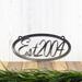 Oval established year metal wall art, in raw steel.