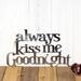 Always Kiss me Goodnight metal wall art, in raw steel.