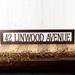Rectangular metal address sign in copper vein powder coat.