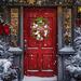 Merry Christmas wreath with plaid ornament, red berries, and white ribbons hanging on a red front door in a snowy holiday scene.