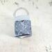 Top with handle of bag design 