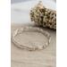 Set of three sterling silver stacking wavy bangle bracelets.
