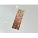 this cute fall bookmark has a brown ombre background with fall theme prints