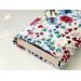 the inside of the padded book pouch matches the outside of the flower book cover