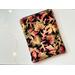 this leaves tablet sleeve has a black background with fall leaves all over the fall tablet pouch