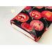 the inside of the padded book pouch matches the outside of the fall book cover