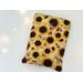 this fall sunflower book sleeve has sunflowers all over the floral book holder with brown leaves
