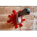 wooden wall-mount knife hook set hanging on wood wall with red blood splatter