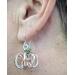 Pumpkin wire earrings handmade and worn by Cyndi Jones