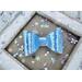 Bow choice A: Entire bow is a mermaid textured holographic lavender. Bow is approx. 2 1/2 x 1 1/2.  Bows are sold individually.