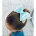 My 4 year old wearing a Soft layered blue and white tulle & sparkly star jelly faux leather with a soft heart charm in the middle.