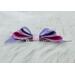 Side view of all 4 layers of lavender and pink glitter 4 layer bow. Bow is sold individually. 