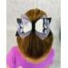 My 4 year old modeling a black and white glitter ghost bow with dripping lavender rhinestones and lavender tulle. Bow is sold individually. 