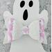White glitter bow with pink & white ghost design, with very light pink lace ribbon. Bow is approx. 5 x 2 1/2. Bow is sold individually.