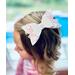 Layered white glitter bow with pink & white ghost design, with very light pink lace ribbon. Bow is approx. 5 x 2 1/2. Bow sold individually.