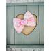 Textured floral inspired Soft pink, peach, blue, & yellow, hair bow, with Pink sparkle shell charm on top. Bow is approx. 4 x 3. 