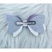 Back view of lavender and pink glitter 4 layer bow. 