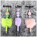 Photo of 3 different colored rainbow beaded faux fur pens. From left to right: Green, lilac, and peach. Pens are sold individually