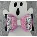 Close up: black glitter bow, w/ pink tulle, white w/ pink & black cute ghost print, w/ pink glitter and sequin on top. Sold individually. 