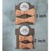 Size reference for 2"  bows and 3" bows. Print is a soft yellow & orange school bus. Can be purchased as one bow, or two matching bows. 