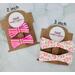 Close up of 2 stripe 2" bows, and 2 rainbow 3" sized bows. Can purchase one bow or two matching bows.