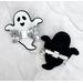 
Front & back view of white and black ghost shaped hair bow, with spider web printed design on top. Bow is sold Individually.