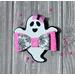 White & black ghost shaped bow, w/ pink glitter spider web design. Ghost is wearing tiny pink bow.  Bow is approx. 3 x 3. Sold Individually.