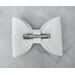 Close up of back of hair bow for detail. 