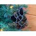 German Shepherd Ornament in Black, hanging in a Christmas Tree.