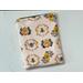 this beehive tablet sleeve has a light pink background with beehives and bees all over the insect tablet case