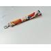 a side angle of the citrus lanyard wristlet