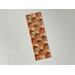 this pumpkin bookmark has pumpkins all over it with little cats peeking out of the pumpkins in a pumpkin costume