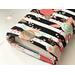the inside of the padded book pouch matches the stripe book cover