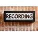 wood recording studio LED light up lightbox in black hanging on wall for home studio, podcasters, musicians, and gamers