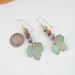 Super cute autumn earrings. Celebrate fall with these sweet dangles which have three teeny tiny copper enamel pumpkins of pastel green, orange, and lavender, with a pale green leaf swinging below. Super lightweight. Photo shows a dime for size reference.
