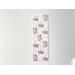 the cat unicorn page marker is on a white table