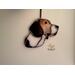 Beagle ornament hanging on a wall.